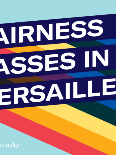 Graphic with light blue background and three slanted bars with rainbow stripes giving a 3D effect. Each bar has one line of text. Together the read, "Fairness Passes in Versailles!: