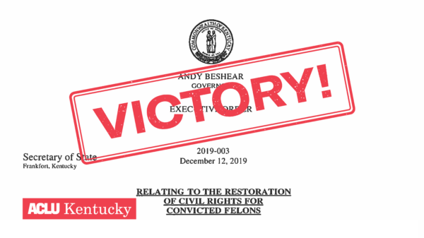Copy of executive order restoring voting rights to some Kentuckians with past felony convictions with red stamp graphic reading "VICTORY!"