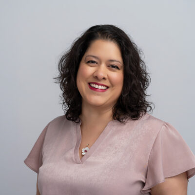 shanna in a shirt smiling