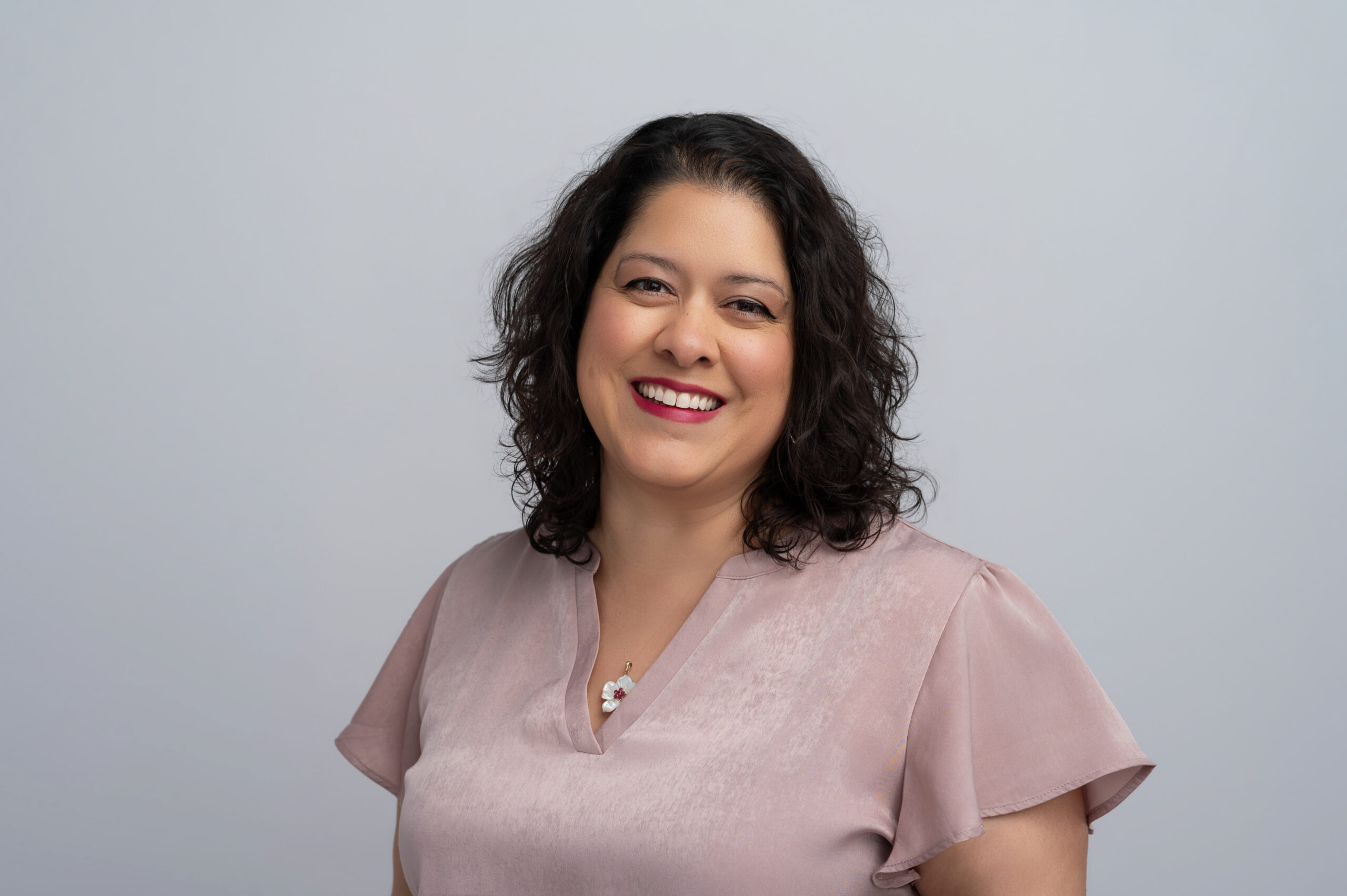 shanna in a shirt smiling