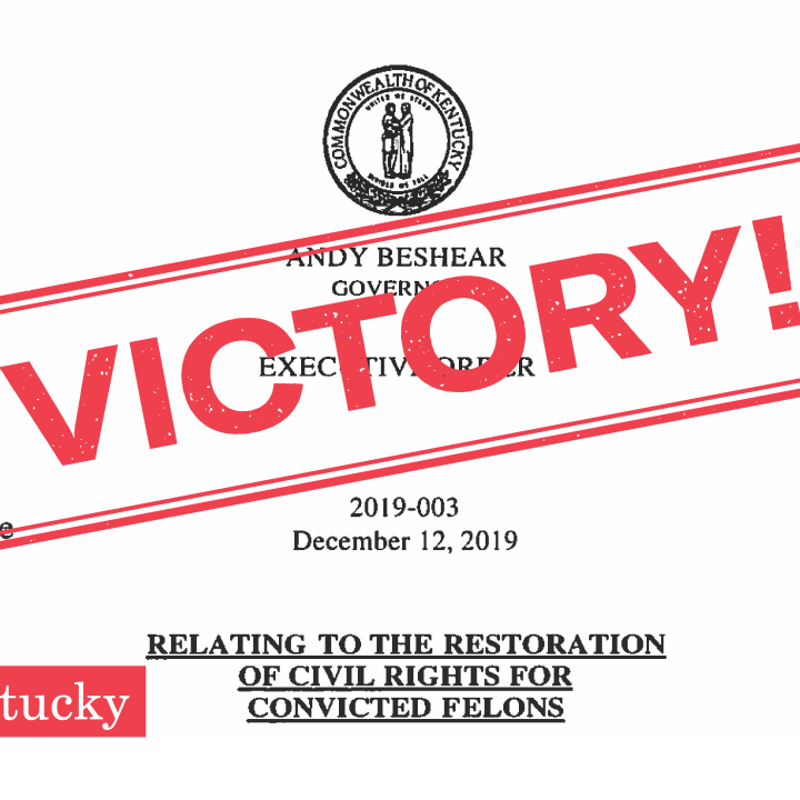 Copy of executive order restoring voting rights to some Kentuckians with past felony convictions with red stamp graphic reading "VICTORY!"